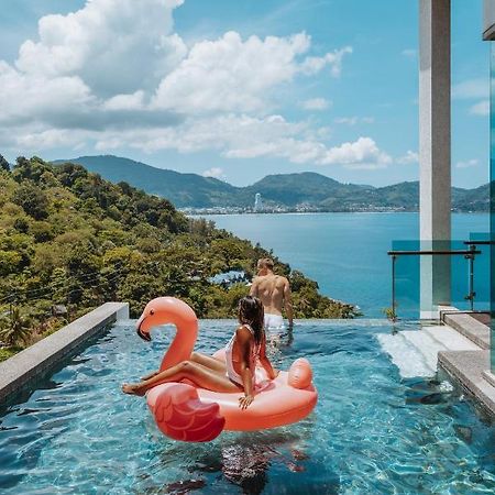 Wyndham Grand Phuket Kalim Bay Hotell Patong Eksteriør bilde The swimming pool at the hotel